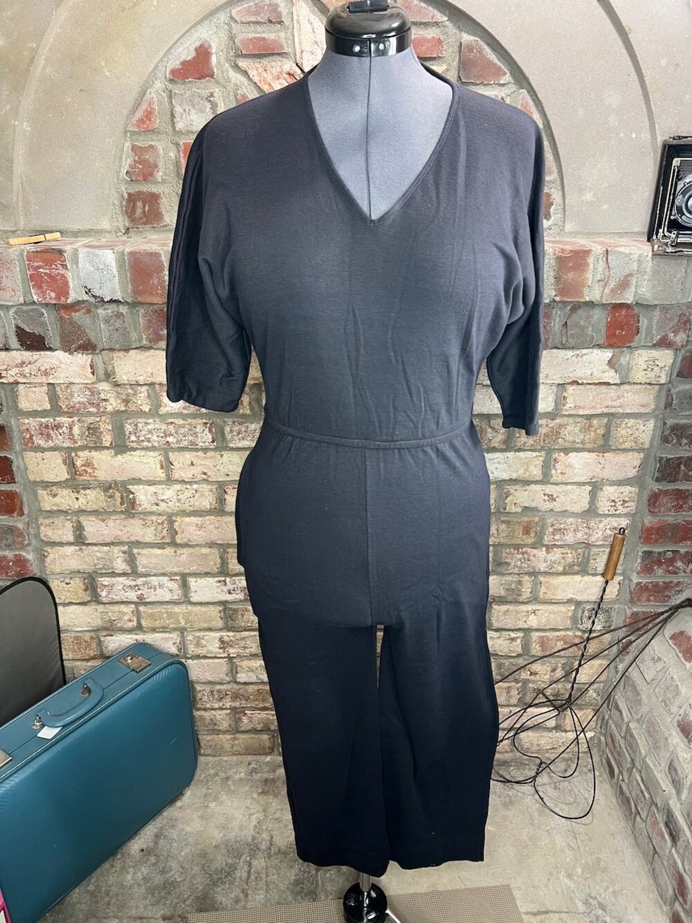 jumpsuit knit black V neck pockets